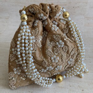 Simran Bronze Pearl Potli Bag (ST810)