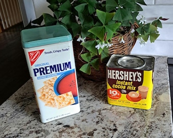 Two Vintage Food Tins, 1987 Nabisco Premium Saltine Crackers, 1960s Hershey's Instant Cocoa Mix
