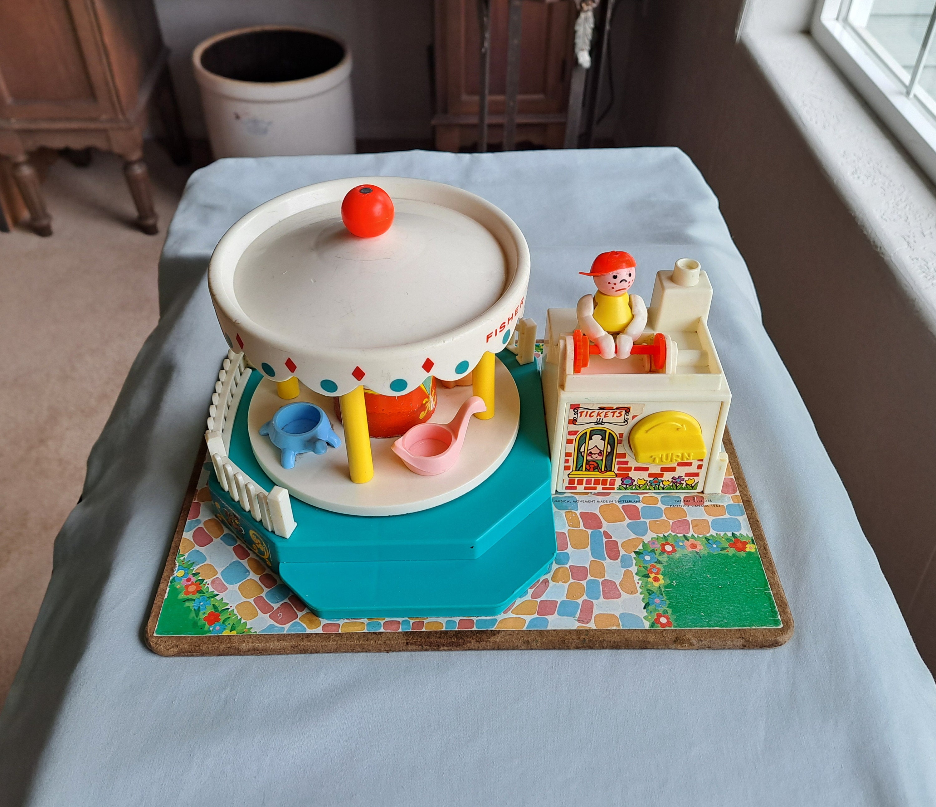 Fisher price merry store go round 1964