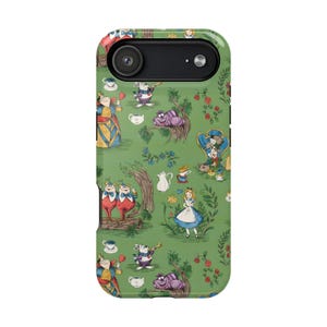 May include: A phone case featuring a green background with illustrations of characters from Alice in Wonderland. The design includes Alice, the Mad Hatter, the Cheshire Cat, and other iconic elements from the story.