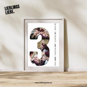 May include: A framed print featuring a collage of photos in the shape of the number 3. The photos show couples in various poses. The print includes the text "LIEBLINGS LIEBE" and "3 JAHRE | 36 MONATE | 156 WOCHEN | 1095 TAGE".