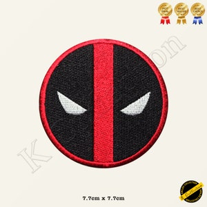 May include: Red and black embroidered patch featuring the Deadpool logo. The logo is a stylized face with a red vertical line down the center and white eyes.