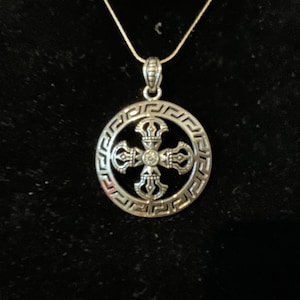 Double dorjee ( vajra) round pendant, white metal (0167) pendant only
