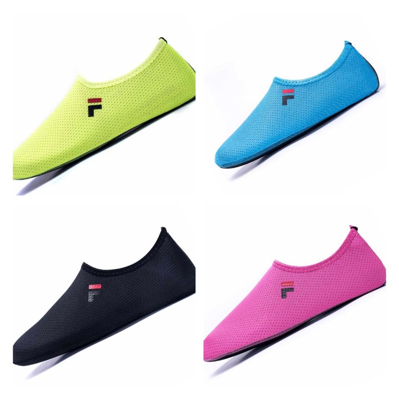 May include: Four pairs of water shoes in different colors: green, blue, black, and pink. The shoes are made of a breathable mesh material and have a simple design with a small "F" logo on the top.