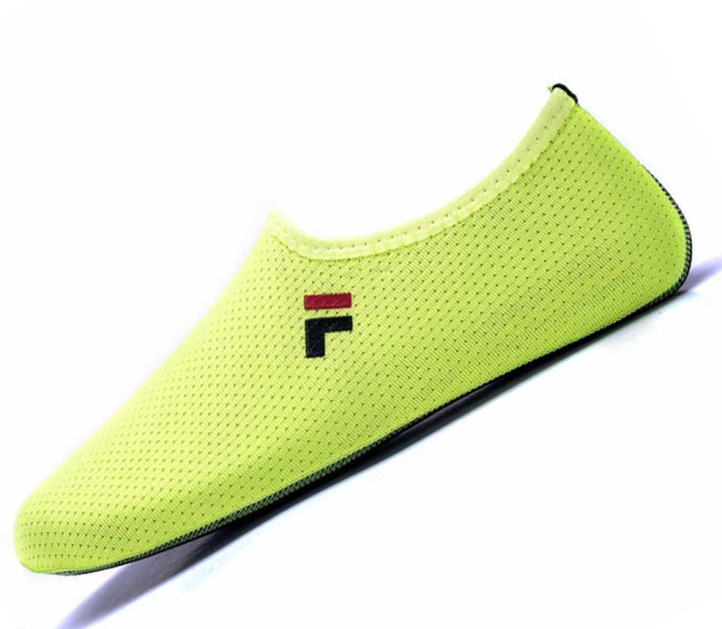 May include: A pair of bright green water shoes with a black "F" logo and a red stripe. The shoes are made of a breathable mesh material.