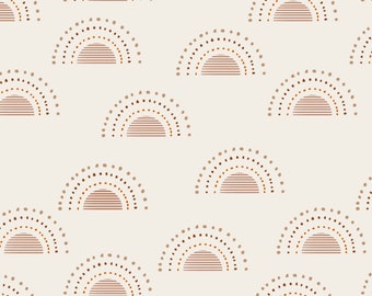 May include: A seamless pattern featuring a repeating design of brown and orange sunbursts on a light beige background. The sunbursts are made up of a series of small dots and lines.