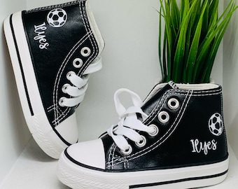 Black lace-up high-top sneakers