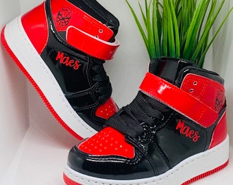 Black and red high top shoes