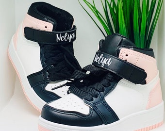 Black and pink high-top sneakers