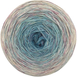 May include: A round ball of yarn with a gradient color scheme, transitioning from cream to teal and deep blue in the center. The yarn has a subtle metallic sheen, with strands of gold. The yarn is likely for knitting or crochet projects.