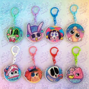 TADC Headshot Keychains