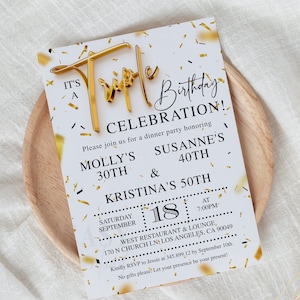 May include: A white and gold invitation card with gold confetti. The text on the card reads "It's a Triple Birthday Celebration!" and lists the names Molly, Susanne, and Kristina with their ages. The invitation is for a dinner party at West Restaurant & Lounge on Saturday, 18th September at 7:00 PM.