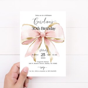 May include: A pink and gold birthday invitation with a watercolor bow and the text "Join us to celebrate Carolina's 30th Birthday. Saturday, October 25, 7pm - 12 am, 20XX. Coquette Bistro, 345 N. Hunter Street, Dallas, TX 19382. RSVP by Oct. 10th to Jennifer at 567.234.5678"