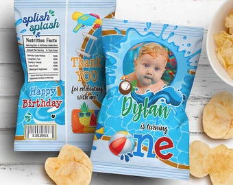 May include: Blue and yellow chip bag with a pool party theme. The bag features a photo of a baby boy, the text "Dylan is turning one", and a swimming pool with a diving board. The bag also includes a nutrition facts label with the text "splish splash".