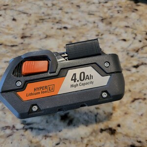 May include: A black and orange power tool battery with the text "HYPER Li Lithium Ion" and "4.0Ah High Capacity".