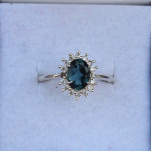 London Blue Topaz Ring: Oval Sterling Silver, Cubic Zirconia Halo