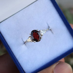 Sterling Silver Garnet Ring: Oval Faceted Red Stone Solitaire