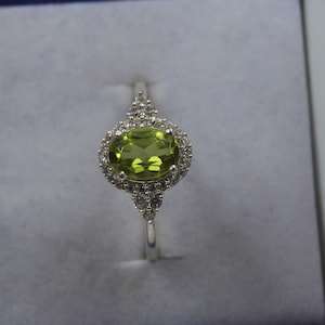 Handmade Oval Peridot Ring: 925 Sterling Silver, Cubic Zirconia