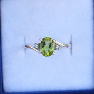 Oval Lab Peridot Ring: Sterling Silver August Birthstone