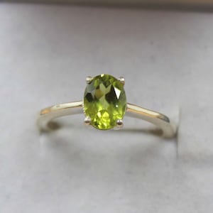 Natural Peridot Ring: Oval Green Gemstone, Sterling Silver