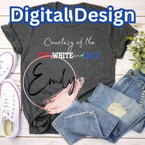 May include: A gray t-shirt with the text "Courtesy of the RED, WHITE and BLUE" and the name "Emily" in a circle with a pink brushstroke. The shirt is laid out on a wooden surface with a pair of white sneakers and blue jeans.