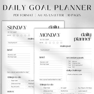 May include: A black and white daily goal planner with a simple design. The planner has sections for a main goal, secondary goals, and a daily challenge. It also includes a section for things to do and notes.