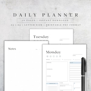 May include: A printable daily planner with a black and white design. The planner includes sections for goals, morning, afternoon, evening, to-do list, and shopping list. The planner also includes a notes section with a dotted grid.