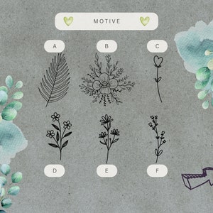 May include: A sheet of paper with a gray background and a light blue watercolor wash. The paper has six black and white illustrations of different floral and leaf designs labeled A through F. The word "MOTIVE" is written in black at the top of the page.