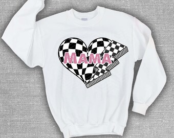 May include: White sweatshirt featuring a black and white chequered heart design. The heart has the word "MAMA" written in pink inside.