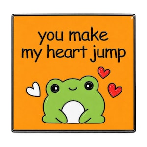May include: A square enamel pin with an orange background featuring a green frog with a white belly. The text "you make my heart jump" is printed in black above the frog, accompanied by one white heart and two red hearts on the sides.