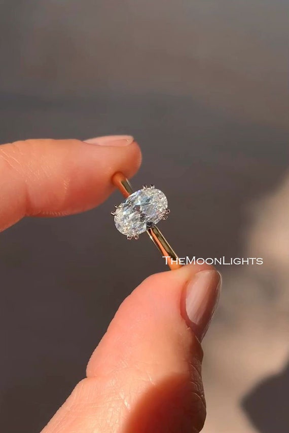 Oval diamond basket setting discount