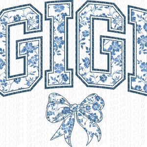May include: Blue and white floral print design with the word "GIGI" in a varsity style font. A blue and white floral print bow is below the text.