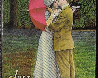 Vintage 1910s Love Postcard Couple Kissing Under Umbrella