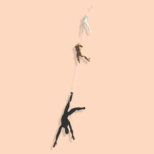 Set of 3 Colorful Polygonal Climbing Wall Sculptures - White, brown, and Black Figures - Fun and Unique Wall Hanging Decor