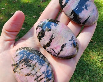 Polished Rhodonite Palm Stone | Pink & Black Crystal