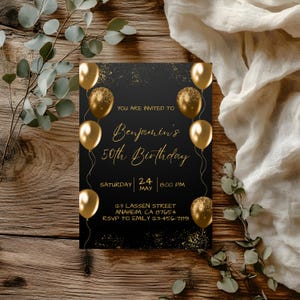 May include: A black birthday invitation with gold text and accents. The invitation includes the text "YOU ARE INVITED TO Benjamin's 50th Birthday" and event details. Gold balloons and confetti decorate the invitation, set against a wooden background.