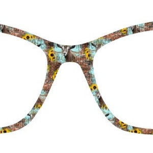 May include: A pair of cat-eye glasses with a blue and brown patterned frame featuring a repeating design of goats and sunflowers.