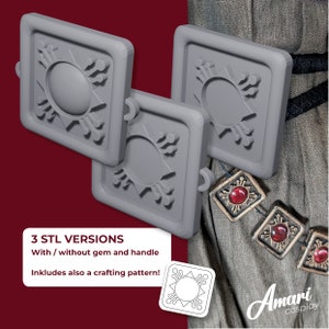 May include: Three gray 3D printed models of a square with a circular design in the center. The models are for cosplay and include a crafting pattern. The text "3 STL VERSIONS" is visible, along with "With/without gem and handle" and "Inkludes also a crafting pattern!" The text "Amari cosplay" is also visible.