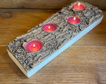 Rustic candlestick with natural bark Advent wreath Christmas season