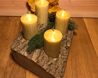 Rustic candlestick with bark for Advent, Christmas decoration Advent wreath