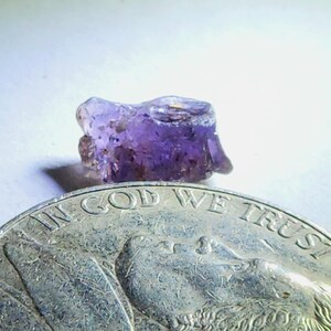 1.245 Carat Purple Color Changing Natural Rough Sapphire from Tanzania. Not Treated.