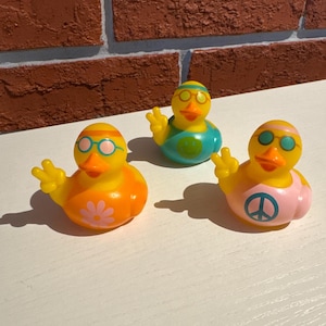 Peace, love and happiness rubber ducks. Great for ducking your favorite jeep or gift! Dont forget your Cruise ducks!