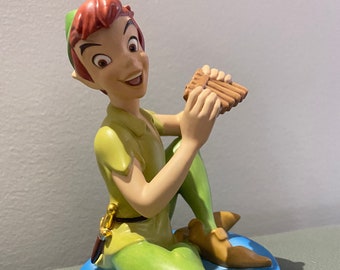25% sale Disney collection: wdcc Peter Pan - &quot;FOREVER YOUNG&quot; (100 dollars) and   Lenox Christmas Minnie&#39;s Porcelain Figurine  (30 dollars)