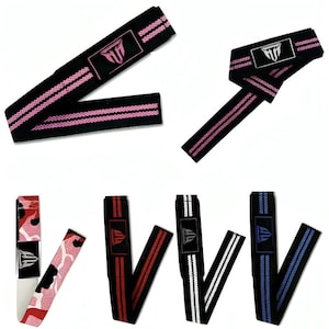 May include: Set of five lifting straps with black fabric and different coloured stripes. The straps have a logo with the letters "HF" in a triangle. The colours are pink, red, white, blue, and camouflage.