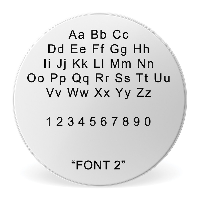 May include: A white circle with black text showing the alphabet in uppercase and lowercase letters, followed by the numbers 1 through 9 and 0. The text "FONT 2" is at the bottom of the circle.
