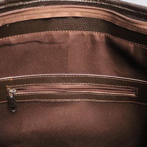 Spacious Large Cowhide Tote Bag with fringe! A Western Cowhide Purse perfect as a Cowhide Tote Shoulder Bag. Genuine Cowhide Leather Purse Bag, an ideal gift.