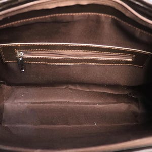 Spacious Large Cowhide Tote Bag with fringe! A Western Cowhide Purse perfect as a Cowhide Tote Shoulder Bag. Genuine Cowhide Leather Purse Bag, an ideal gift.