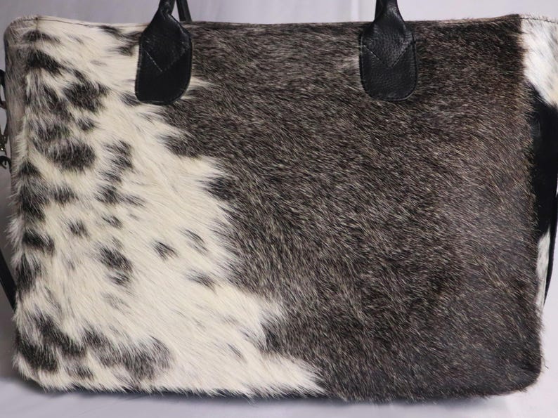 Spacious Large Cowhide Tote Bag with fringe! A Western Cowhide Purse perfect as a Cowhide Tote Shoulder Bag. Genuine Cowhide Leather Purse Bag, an ideal gift.