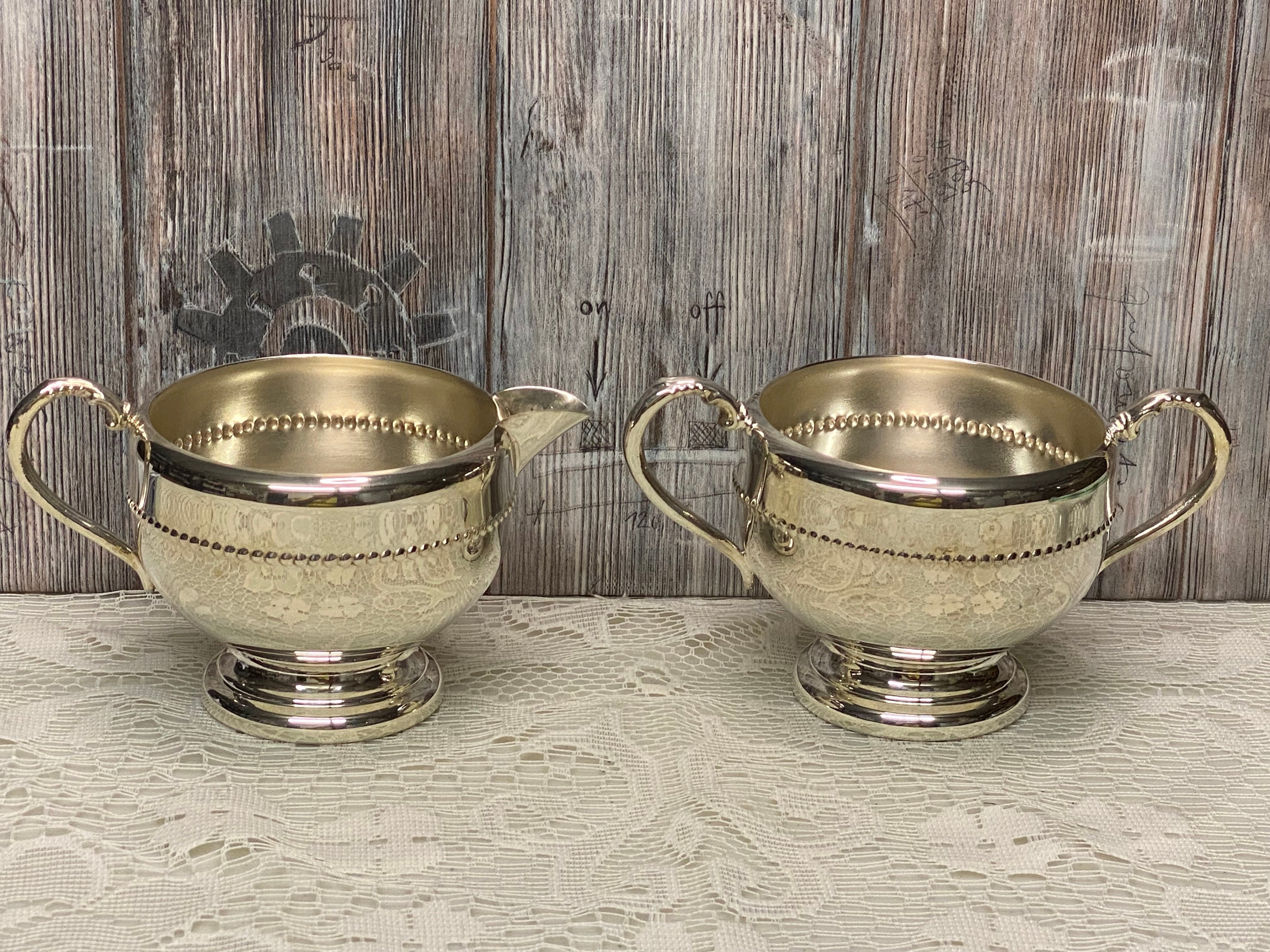 Vintage Silver Creamer and Sugar Viking Plate Ep Copper Lead