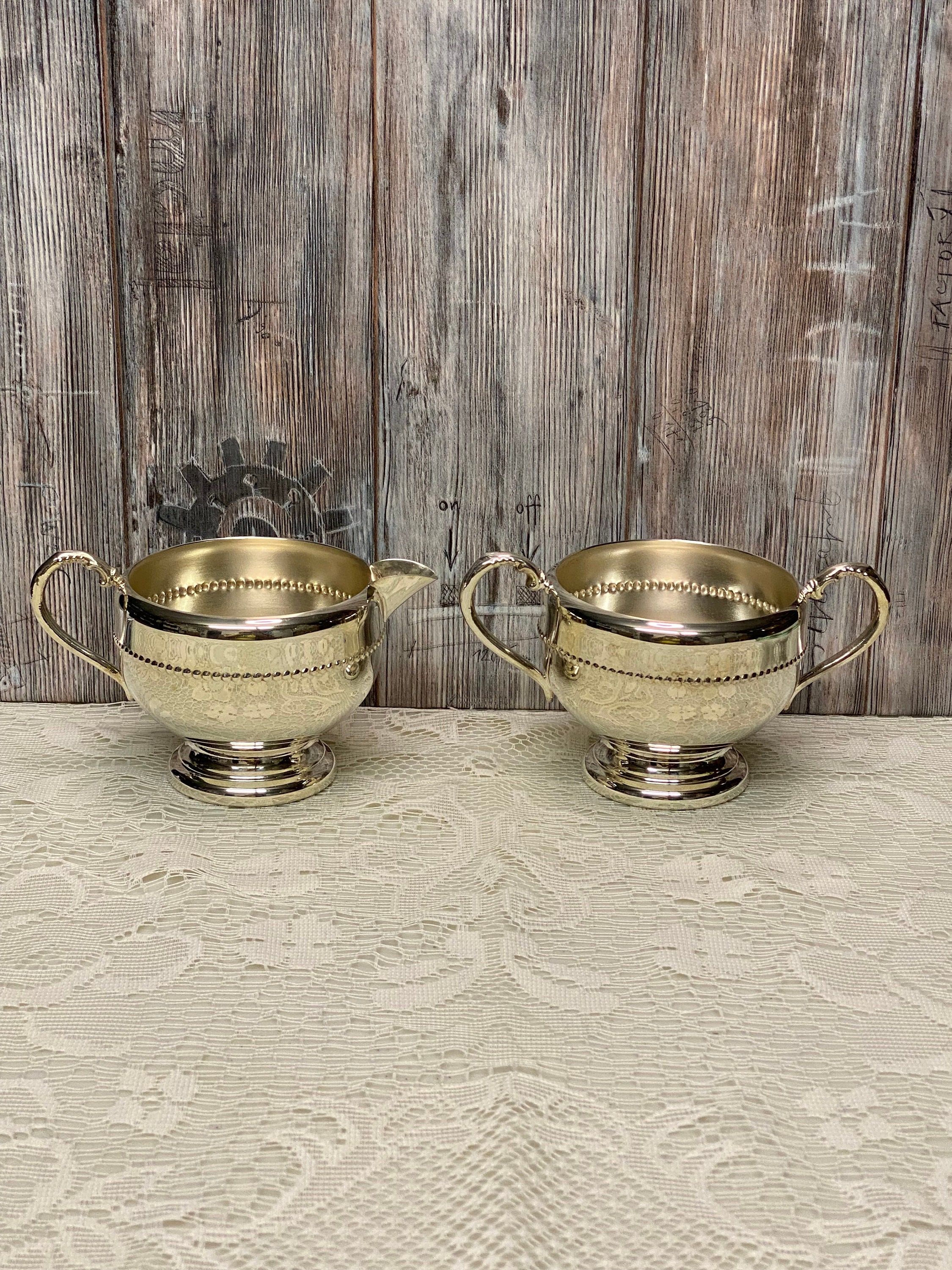 Vintage Silver Creamer and Sugar Viking Plate Ep Copper Lead